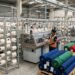 polo t shirt manufacturer in tirupur sewing line factory floor